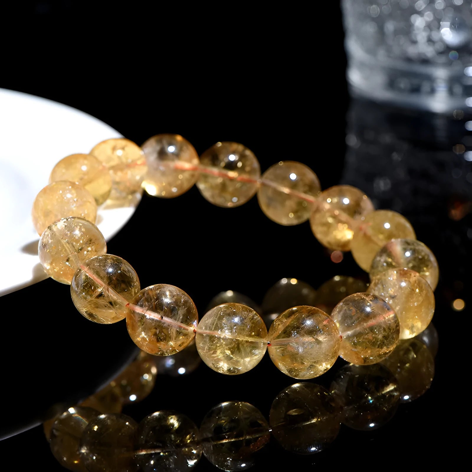 Natural yellow citrine bracelet with spherical beads in Brazilian yellow and violent yellow colour options