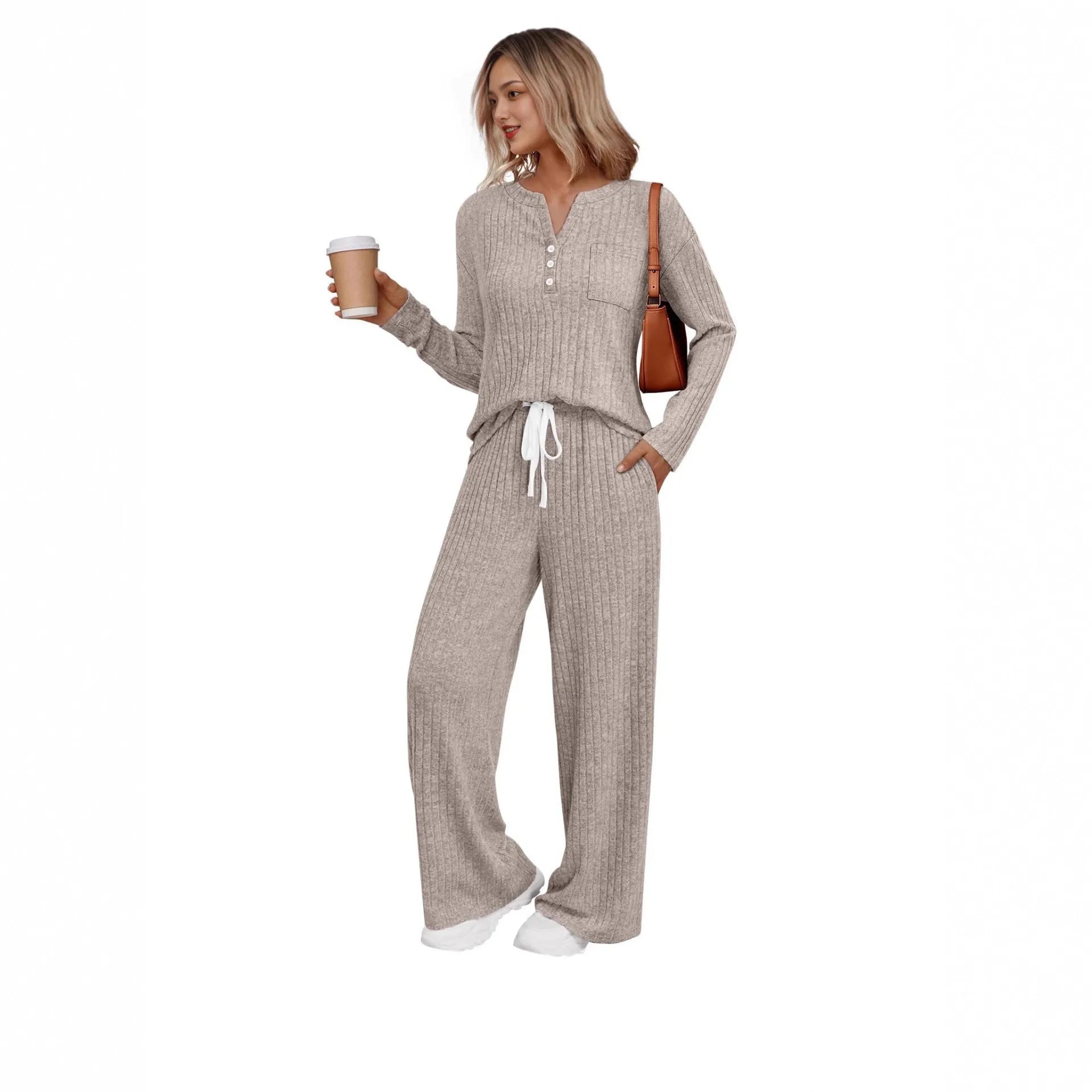 Women's light grey striped knitted long coat with v-neck, long sleeves, and lace-up detail on a mannequin.