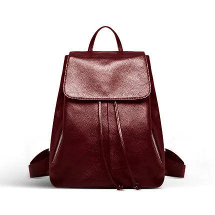 Genuine leather women's backpack in black with multiple internal compartments and waterproof finish