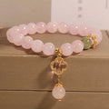 Pink crystal women's bracelet with four-leaf clover pendant and alloy gemstone inlay