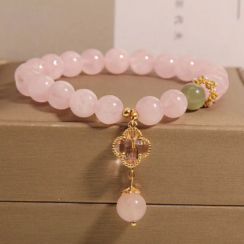 Pink crystal women's bracelet with four-leaf clover pendant and alloy gemstone inlay