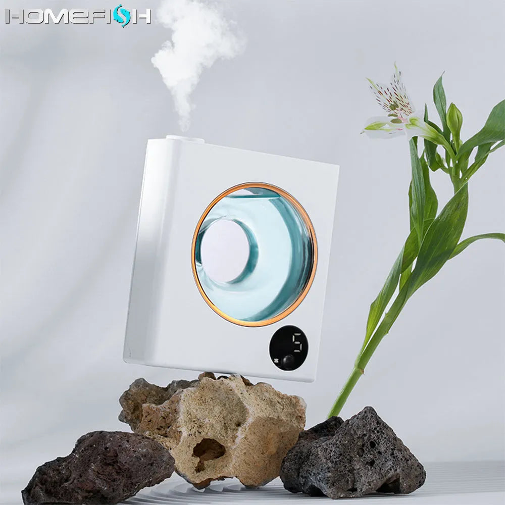 White wall-mounted automatic essential oil diffuser with USB charging port.