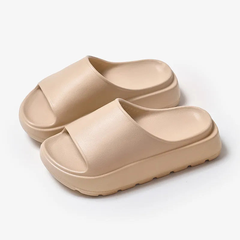 Women's thick sole fish mouth slippers in beige colour, showing the elevated EVA outsole.