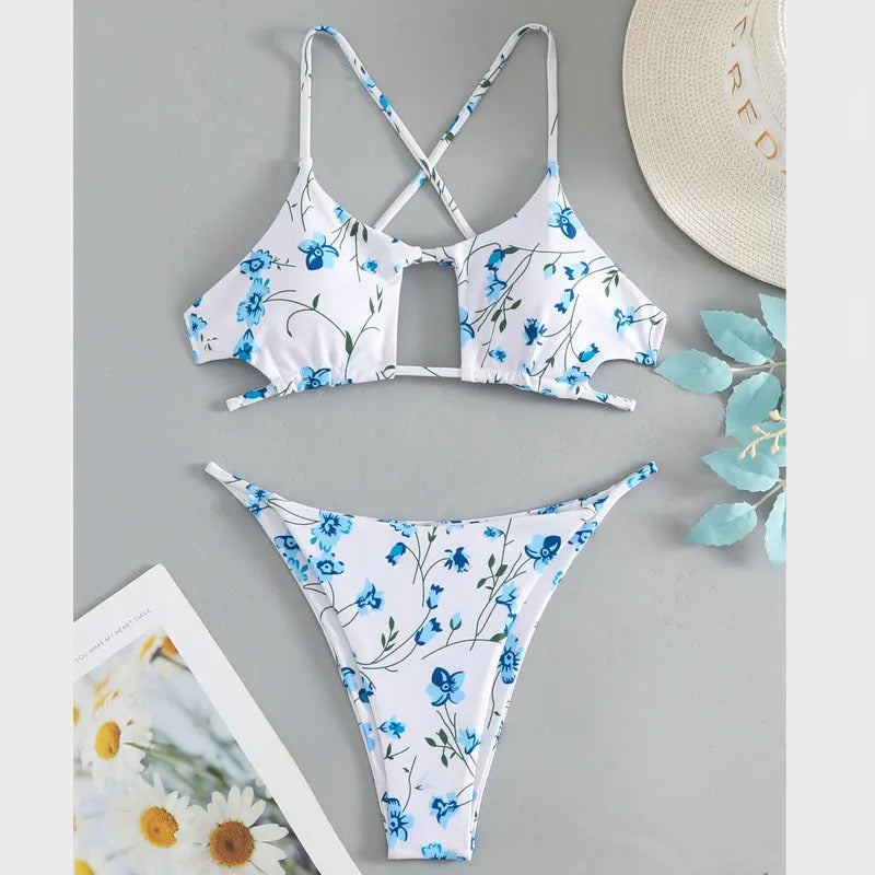 Women's floral print swimsuit set with triangle tie-neck top and matching shorts