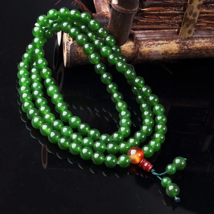Green jade rosary bracelet with 108 quartz rock beads and Buddha head marker