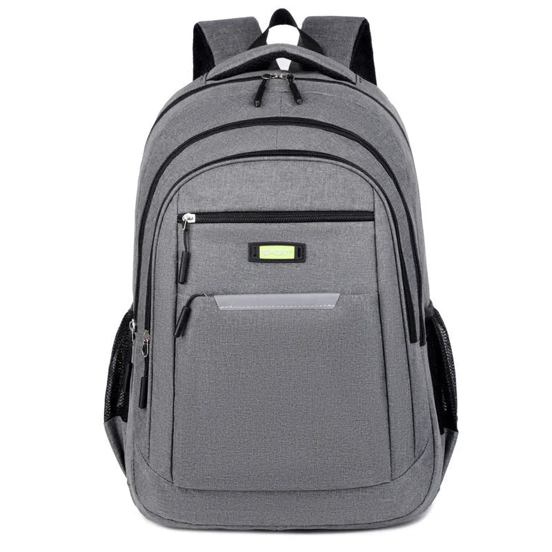 Casual men's Oxford cloth backpack in one of four colours: grey, black, green, or blue.