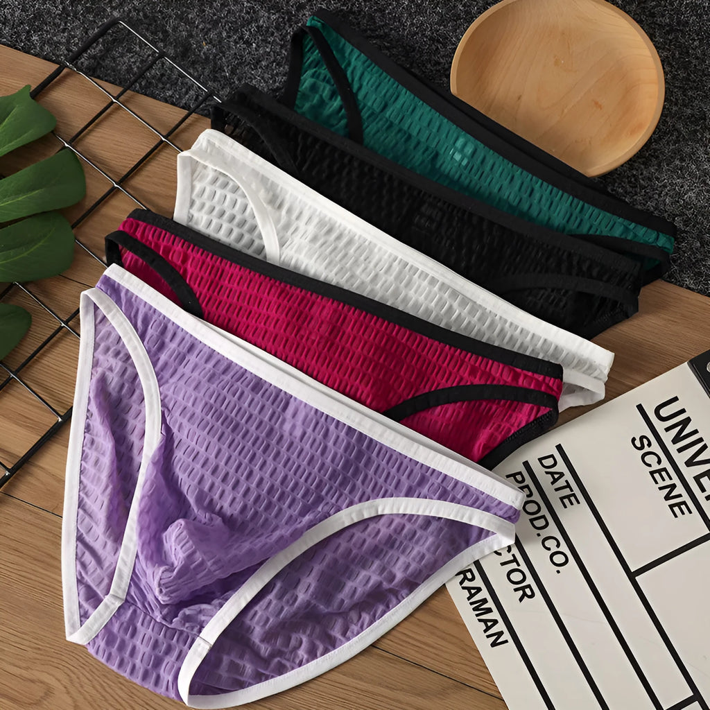 Men's low waist transparent lace underwear shorts in black, green, light purple, rose red, and white colours.