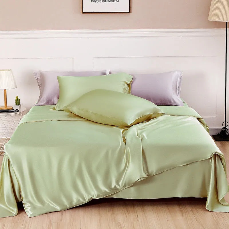 Silk duvet cover in six colour options showing double-sided bedding construction