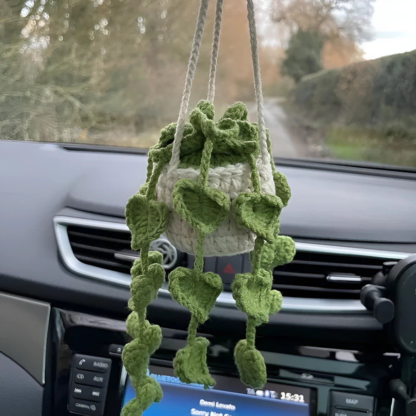 Green and white knitted wool car plant decoration with 8cm base and 25cm hanging rope