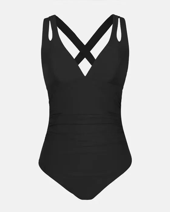 Women's solid colour one-piece swimsuit with triangle top and cross shoulder straps.