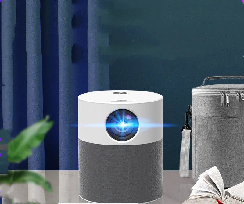 White mini home high-definition projector with 1080P resolution and front projection lens