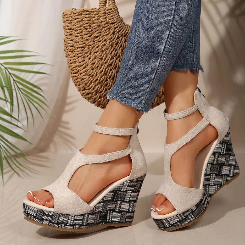 Women's cream white ankle-strap sandals with a buckle, thick rubber sole, and fish mouth scaffold design.