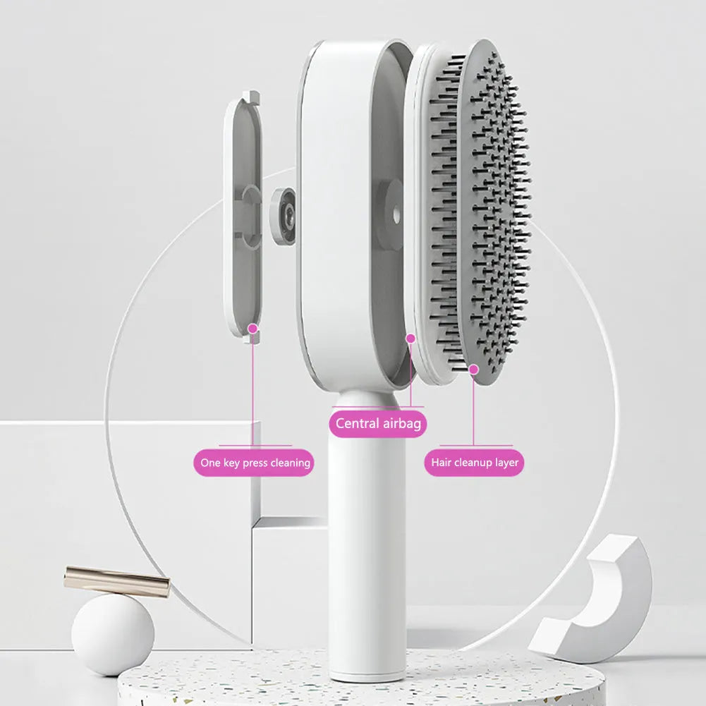 Self-cleaning hair brush with one-key button, air cushion base, and long bristles on a white background.
