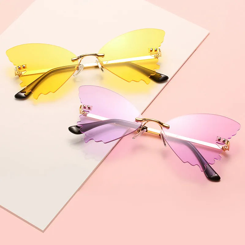 Butterfly rimless sunglasses with UV400 protection in vintage style plastic and metal frame
