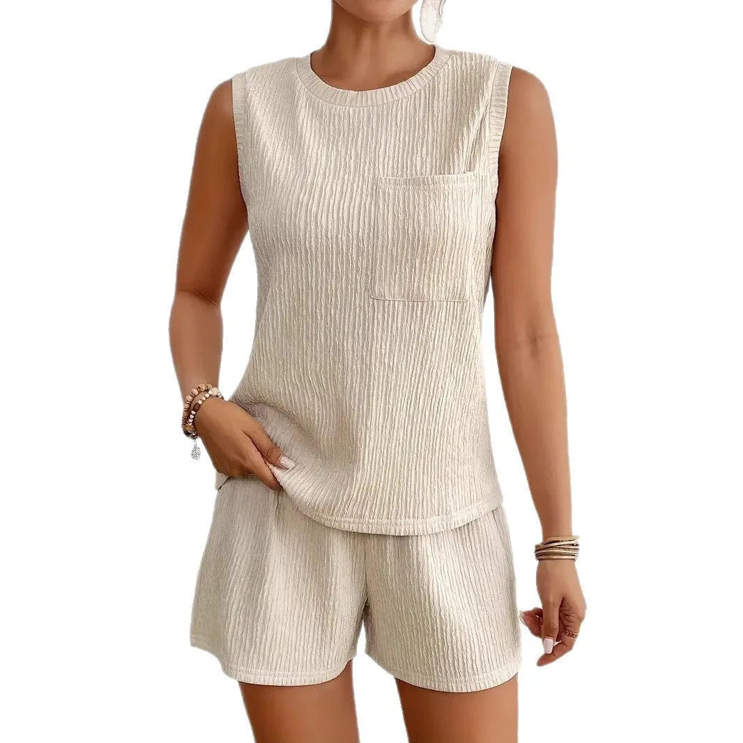 Apricot coloured sleeveless vest and shorts lounge set for women on a hanger.