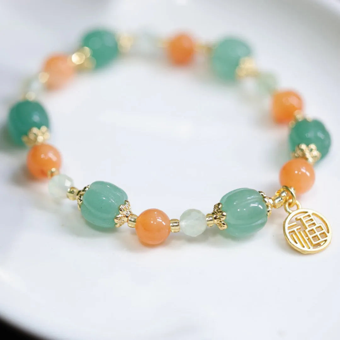 Jinsi Jade Duobao Pumpkin Bracelet with Prehnite stones for a 14-16.5cm wrist.