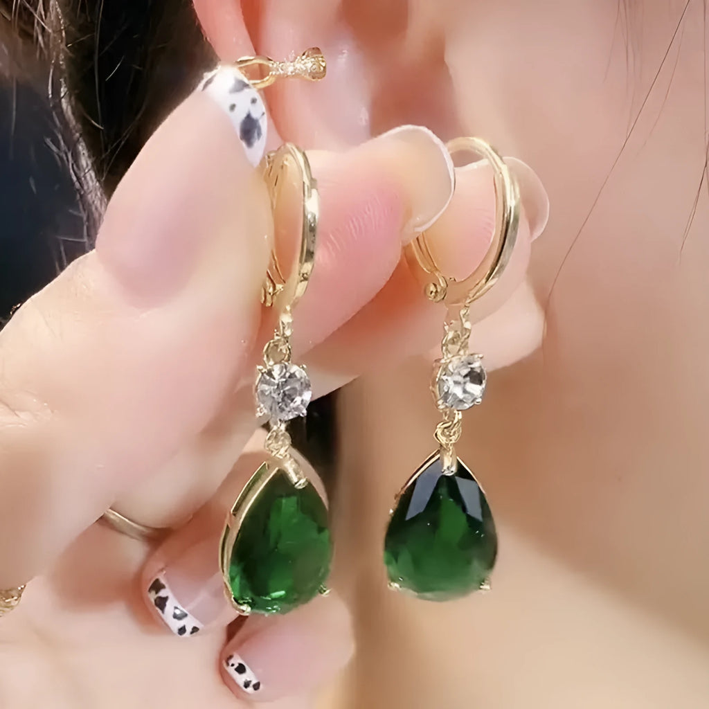A single pair of green geometric teardrop-shaped alloy dangle earrings.