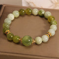 Women's bracelet with a green Xiuyan jade stone in an original light luxury design.