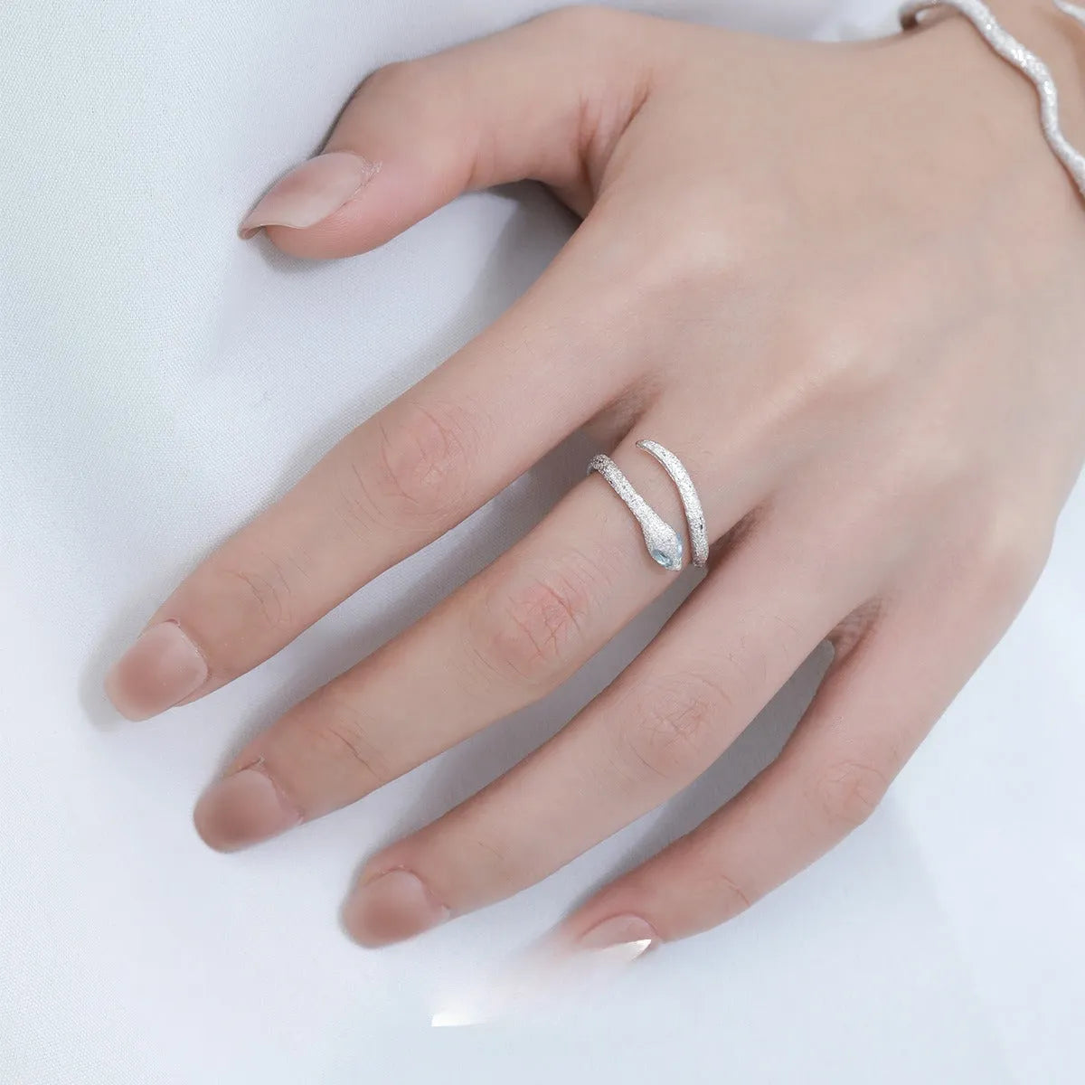 Adjustable snake design women's ring in platinum colour electroplated silver jewellery