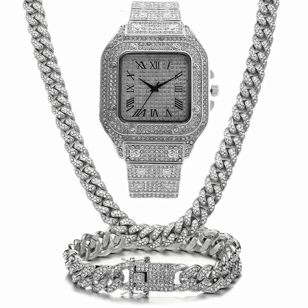 Roman numeral quartz watch with black mesh band, matching bracelet and necklace set in gold tone