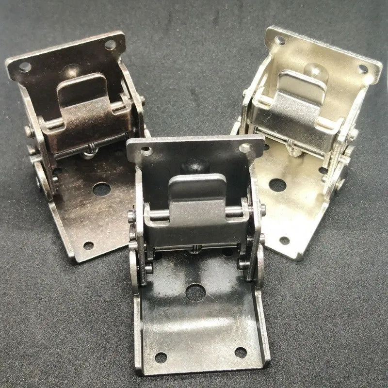 Furniture foot folding hinge in nickel silver finish showing 0-90 degree angle range.