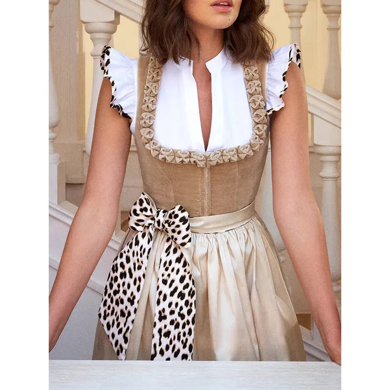 Khaki German Oktoberfest style women's dress with elegant design on mannequin