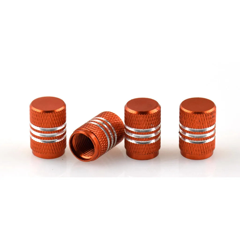 Set of coloured aluminium alloy car tyre valve caps in black, red, blue, gold, silver, green, purple, sky blue, grey, and orange