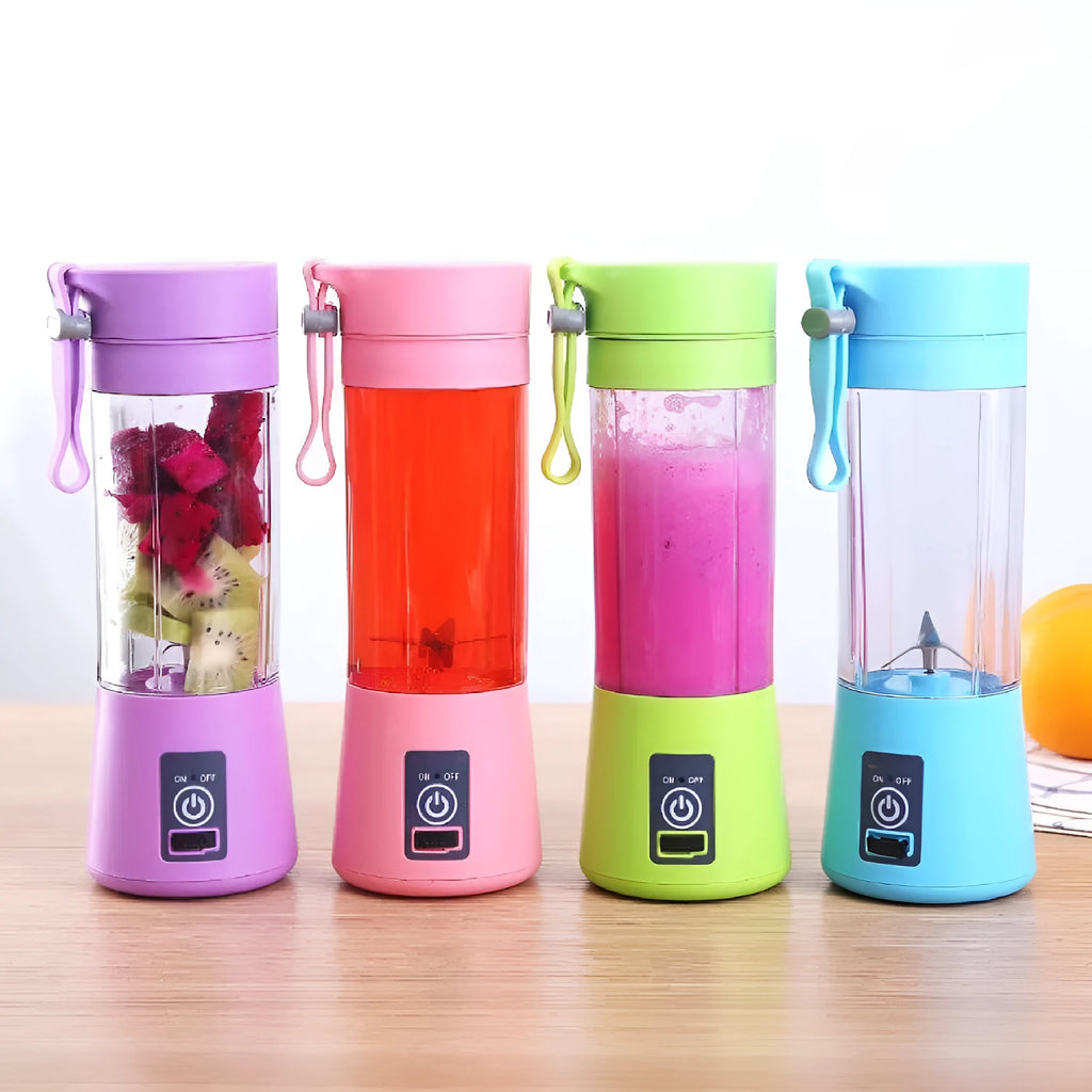 Pink portable USB blender with six blades and a 380ml transparent cup on a table