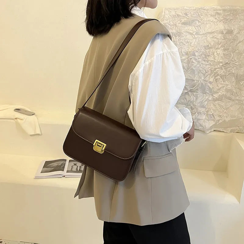 A small horizontal square one-shoulder bag in soft PU material, shown in one of five colours: black, milky white, khaki, dark brown, or coffee.