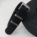 Nylon textile watch strap in army green colour with metal buckle, shown alongside black and blue options.