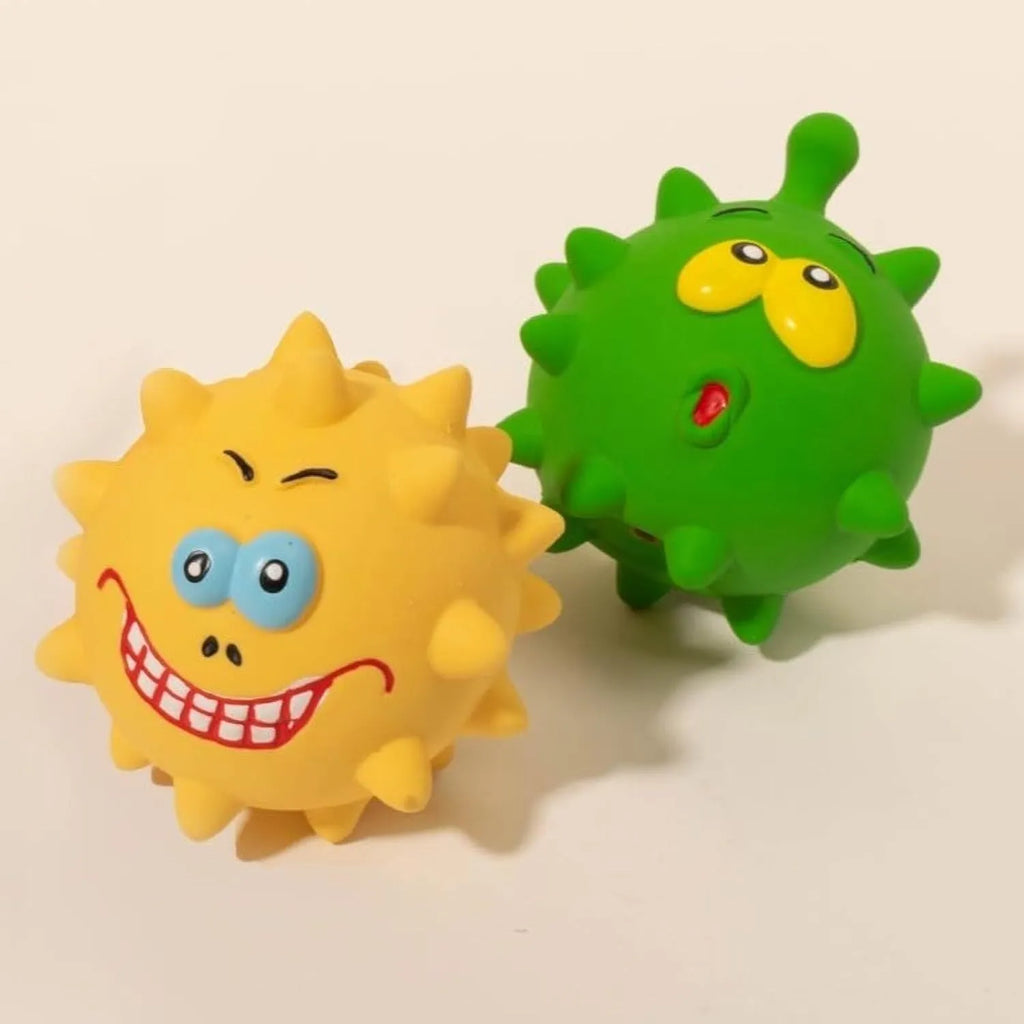 Four coloured natural latex squeaky dog balls with bumpy texture and cute faces