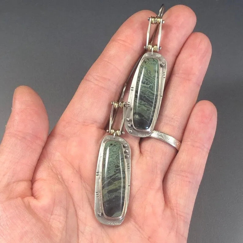 Geometric alloy earrings with two-colour marble pattern and simple styling