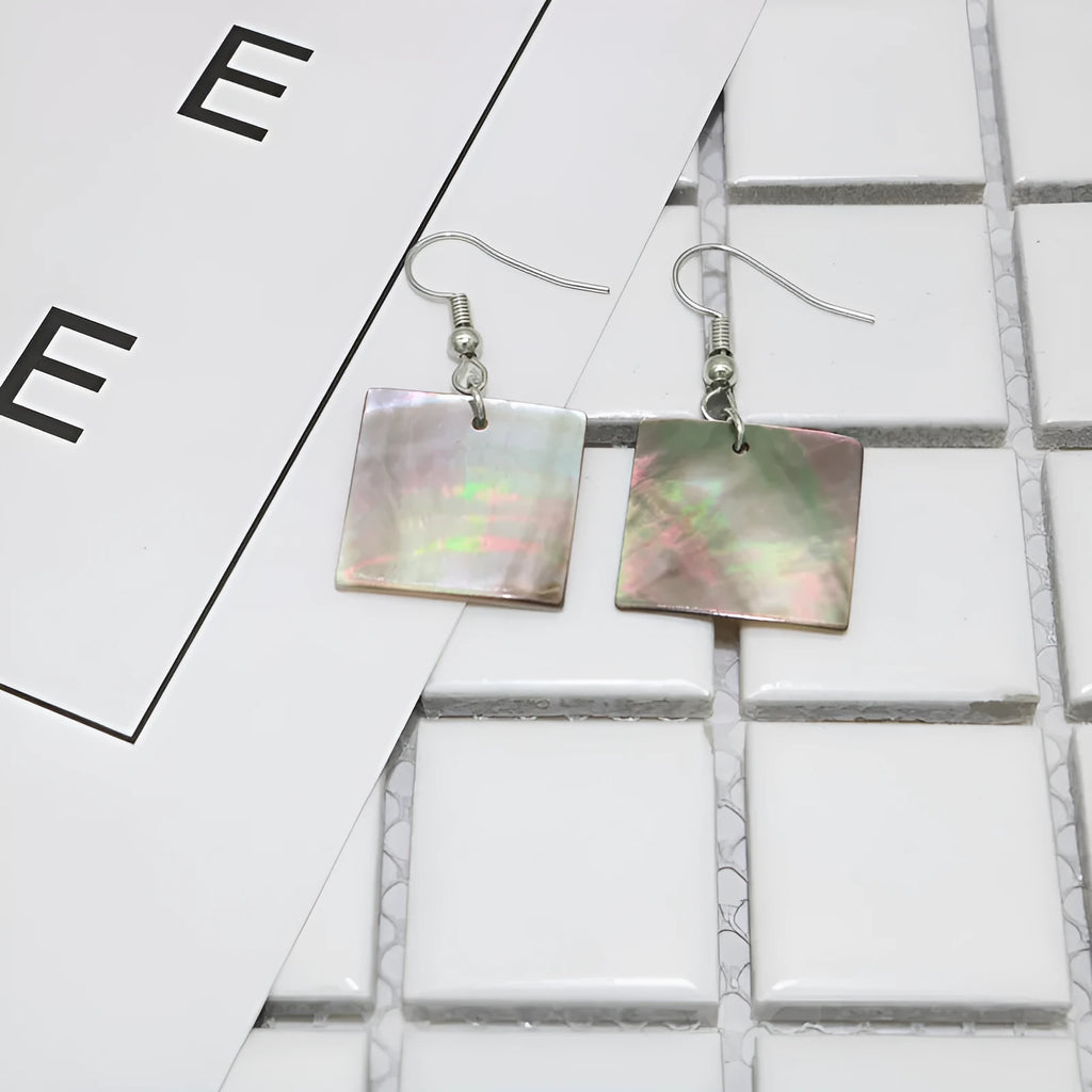 Women's shell geometric earrings with rectangular and square panther designs in natural shell material