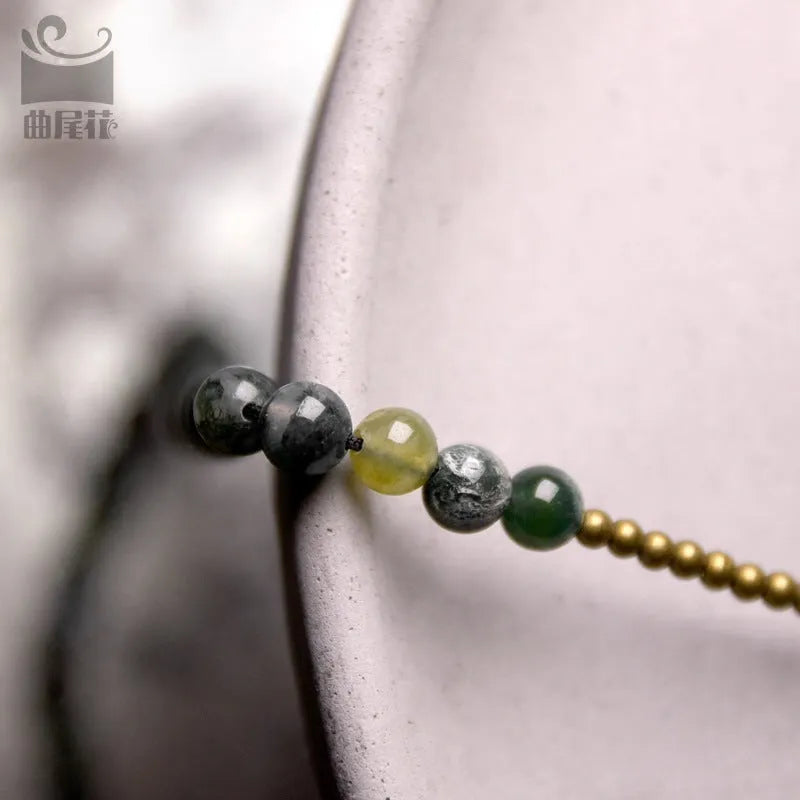 Multi-layered natural crystal ethnic style bracelet for children showing layered design