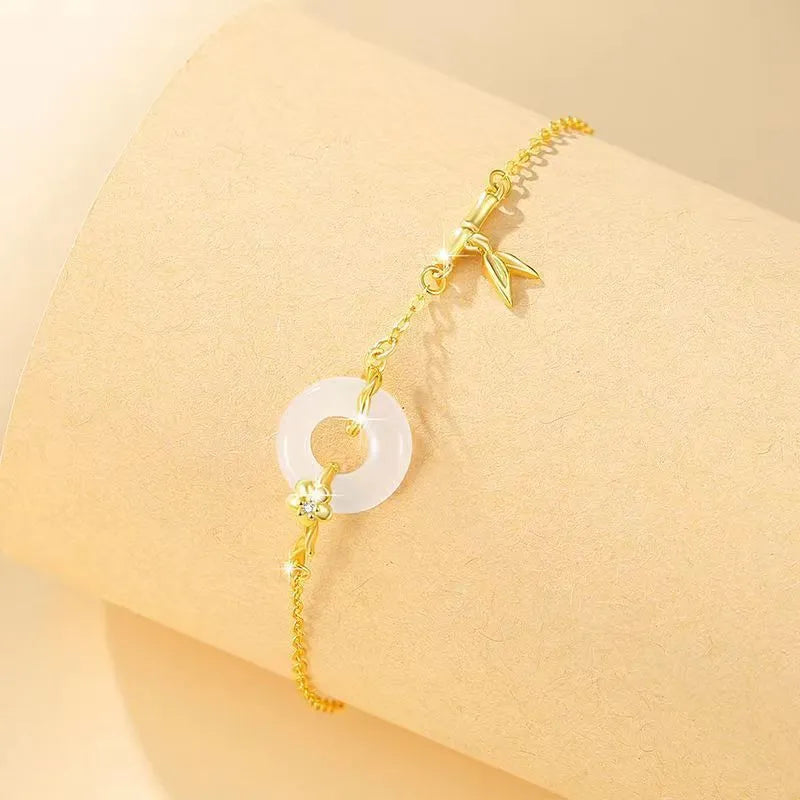 Silver gold electroplated ladies bracelet with starry sky pattern and white chalcedony stone centrepiece