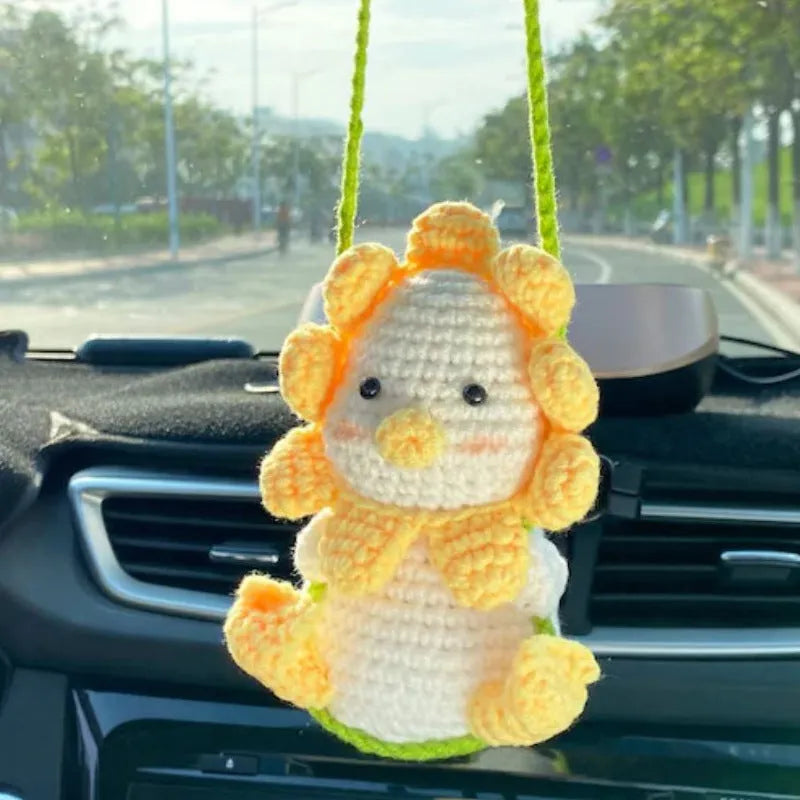 Green and white knitted wool car plant decoration with 8cm base and 25cm hanging rope
