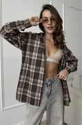 Dark brown striped women's shirt with long sleeves and retro collage stitching detail.