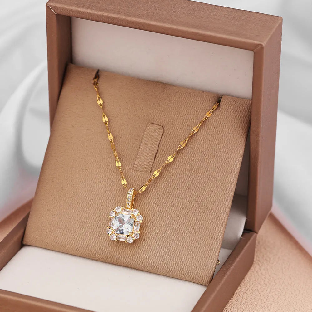 Women's titanium steel geometric zircon clavicle chain necklace with water wave chain in gold.