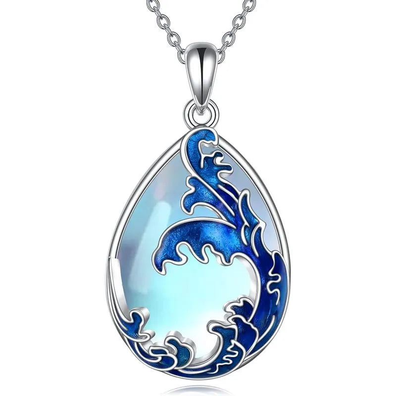 Blue moonstone pendant in a silver heart charm on an adjustable alloy necklace chain.