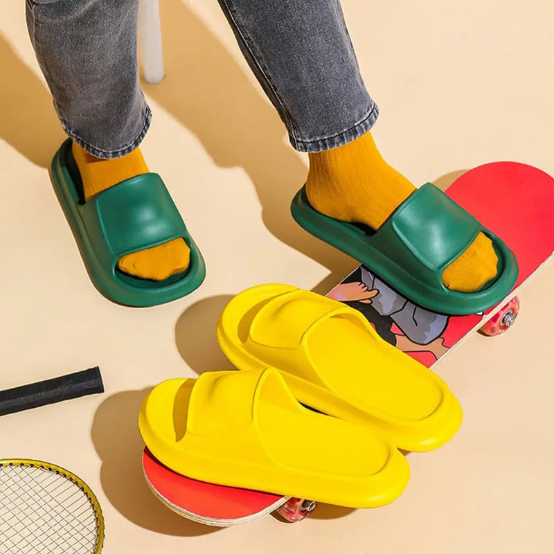 Unisex thick-soled EVA flip flop slippers in multiple colours on a white background.