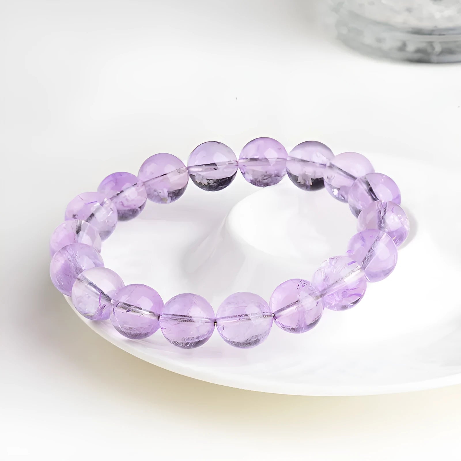 Lavender amethyst crystal bracelet with water ripple design and round beads in light purple colour