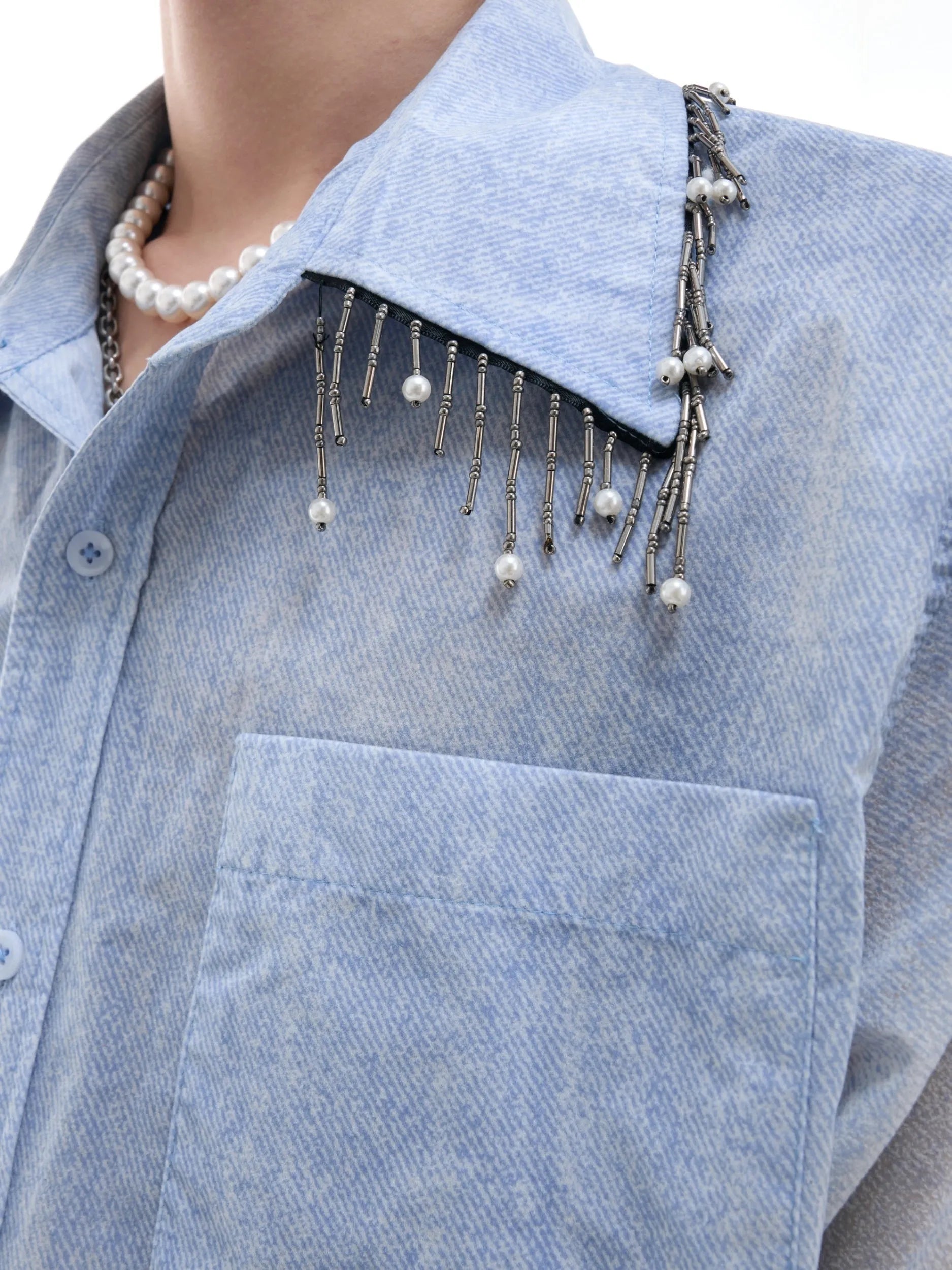 Man's blue and white gradient short-sleeve casual shirt on a hanger