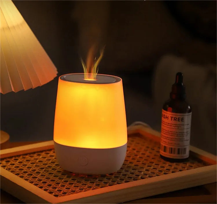White USB aroma diffuser with flame effect lighting and water tank for essential oils