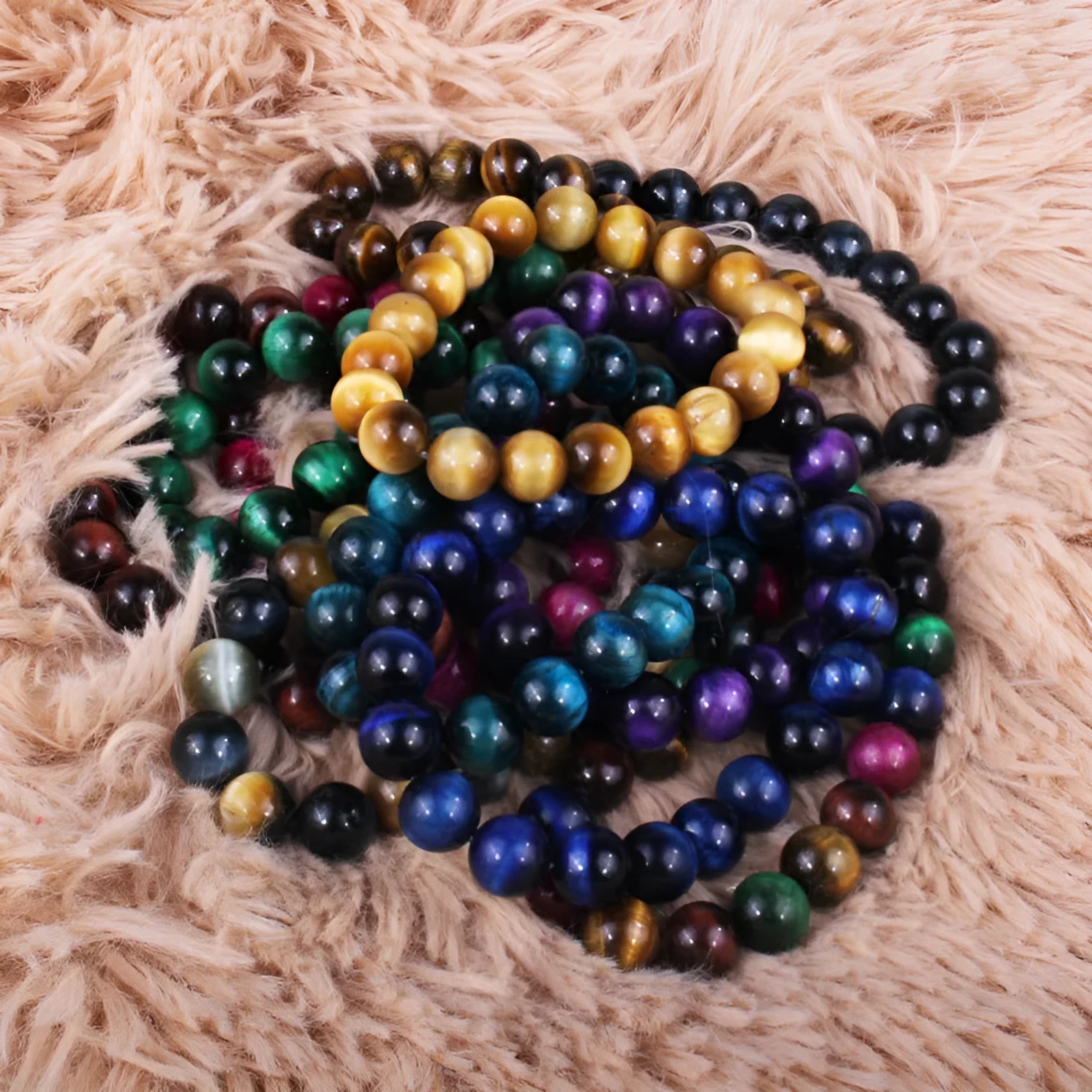Crystal tiger's eye gemstone bead bracelet showing natural colour variations and round bead geometry