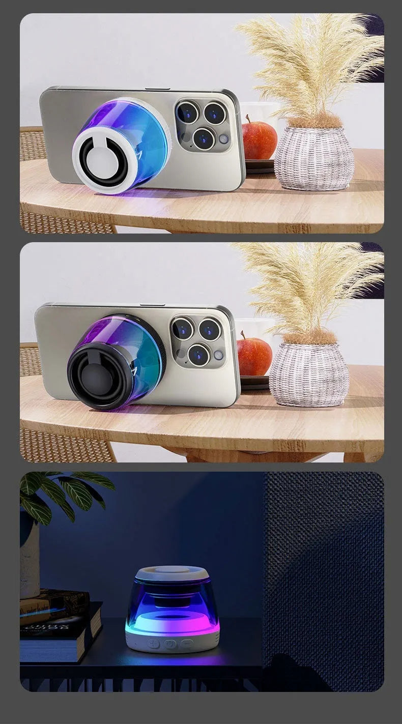 Small portable black Bluetooth speaker with coloured ambient light, shown with a magnetic base.