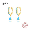 S925 sterling silver water droplet drop earrings with a geometric shape in a gold or silver electroplated finish.