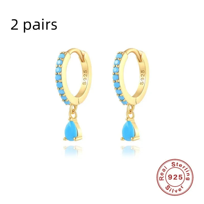 S925 sterling silver water droplet drop earrings with a geometric shape in a gold or silver electroplated finish.