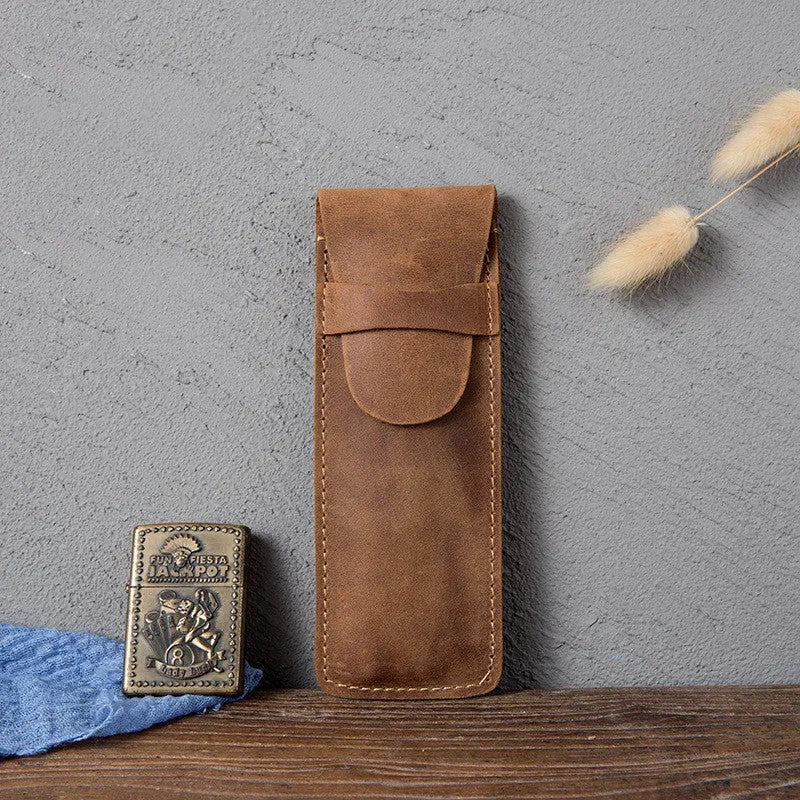 Brown vintage leather pencil case measuring 16x6cm open showing interior