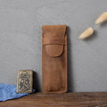 Brown vintage leather pencil case measuring 16x6cm open showing interior