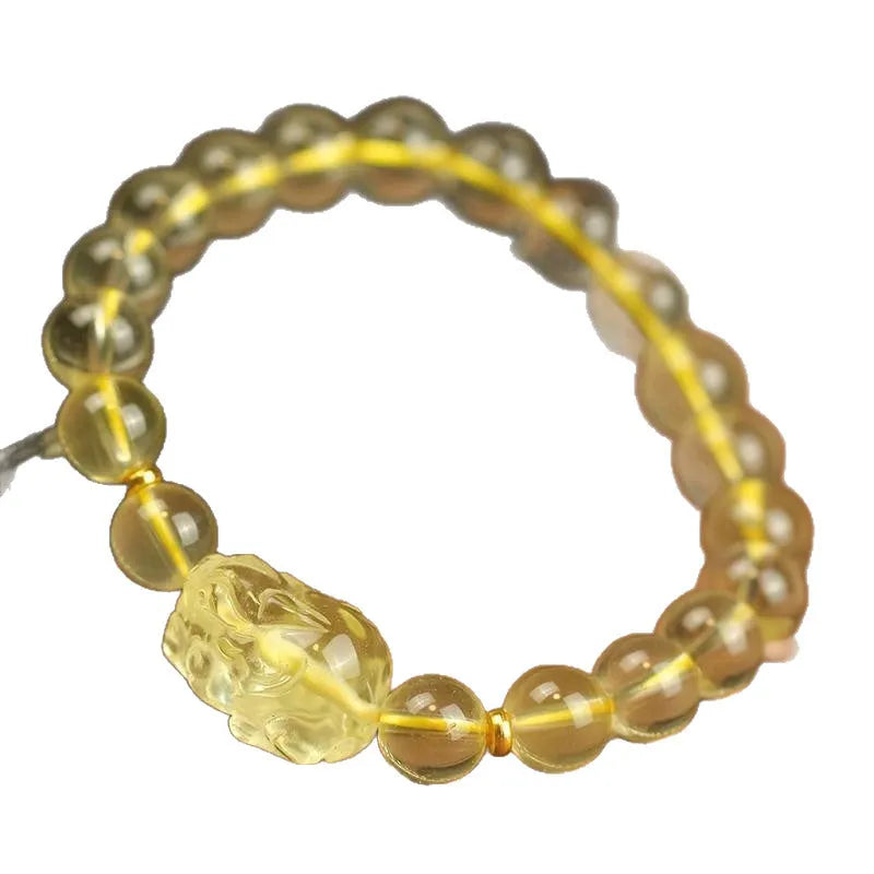 Yellow artificial crystal Pi Xiu bracelet with leather strap in Chinese national style.